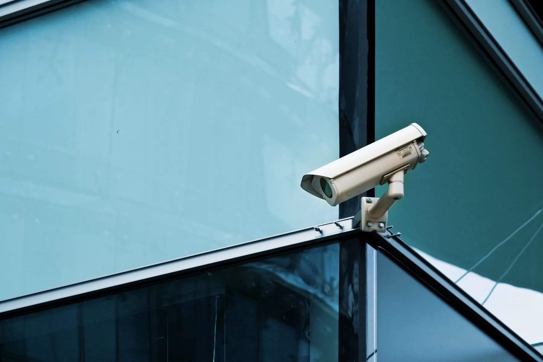 Modern CCTV cameras installed on a commercial building facade